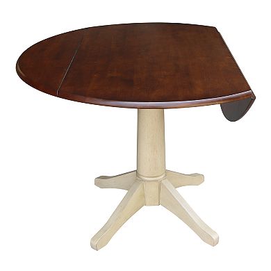 International Concepts Round Dual Drop Leaf Pedestal Table