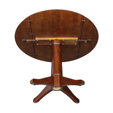 International Concepts Round Dual Drop Leaf Pedestal Table