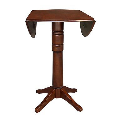 International Concepts Round Dual Drop Leaf Pedestal Table