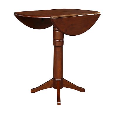 International Concepts Round Dual Drop Leaf Pedestal Table