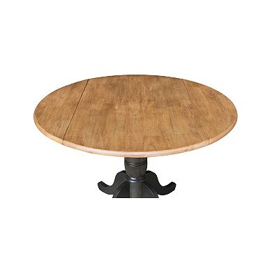International Concepts Pedestal Round Dual Drop Leaf Dining Table