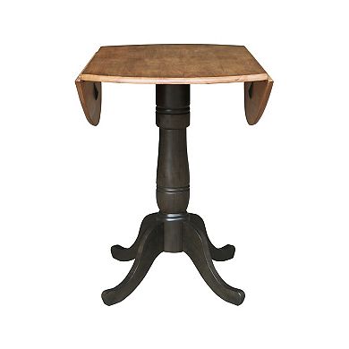 International Concepts Round Pedestal Dual Drop Leaf Dining Table