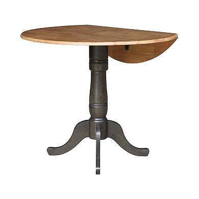 International Concepts Round Pedestal Dual Drop Leaf Dining Table