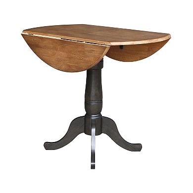 International Concepts Round Pedestal Dual Drop Leaf Dining Table