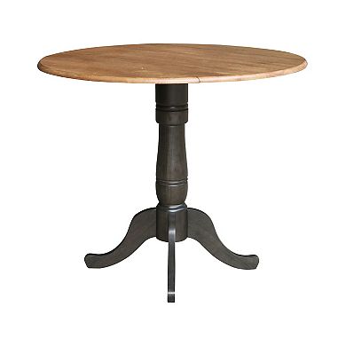 International Concepts Round Pedestal Dual Drop Leaf Dining Table