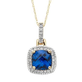 10k Gold Lab-Created Blue Sapphire & 1/8 Carat T.W. Diamond Halo Pendant Necklace