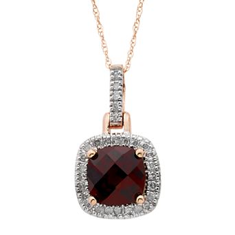 Garnet & 1/8 Carat T.W. Diamond 10K Gold Halo Pendant Necklace
