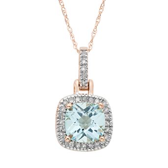 Sky Blue Topaz & 1/8 Carat T.W. Diamond 10k Gold Halo Pendant Necklace