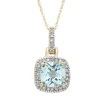 Sky Blue Topaz & 1/8 Carat T.W. Diamond 10k Gold Halo Pendant Necklace
