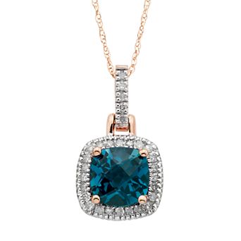 London Blue Topaz & 1/8 Carat T.W. Diamond 10k Gold Halo Pendant Necklace