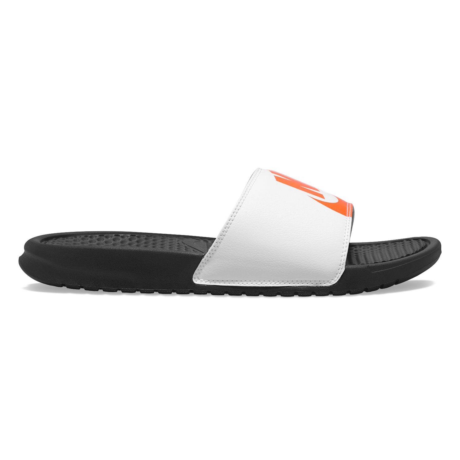 white and orange nike slides