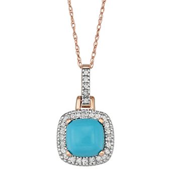 Simulated Turquoise & 1/8 Carat T.W. Diamond 10k Gold Halo Pendant Necklace