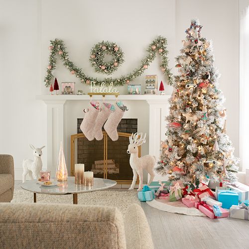 LC Lauren Conrad Herringbone Christmas Tree Skirt in a living room with pastel holiday decor and cheerful colors.