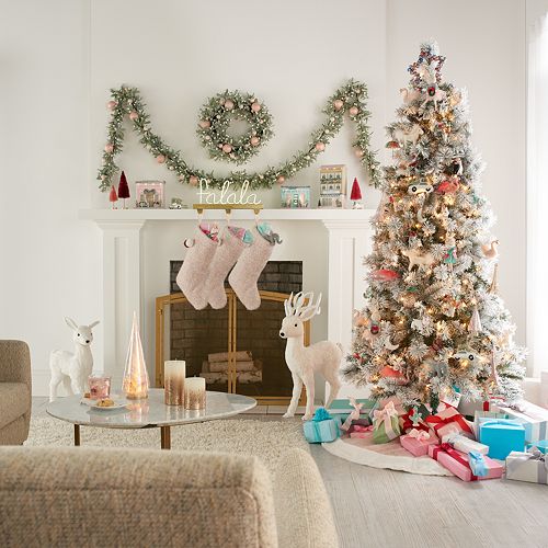 LC Lauren Conrad Herringbone Christmas Tree Skirt in a living room with pastel holiday decor and cheerful colors.