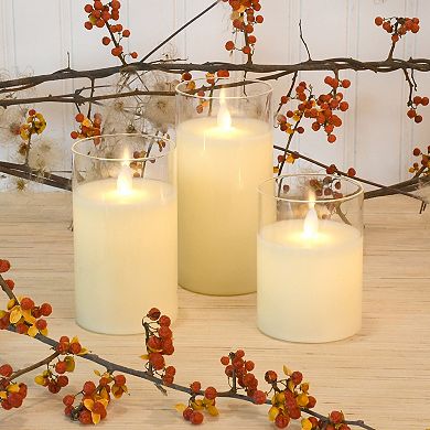 LumaBase Battery Operated LED Realistic Flame Wax Filled Candles in Glass Holders (Set of 3)