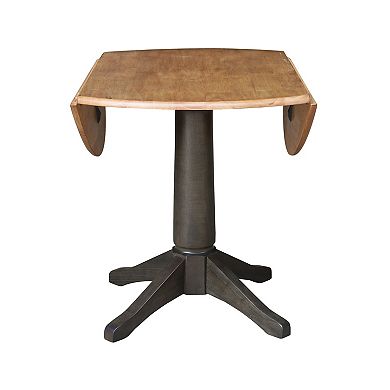 International Concepts Round Dual Drop Leaf Pedestal Table