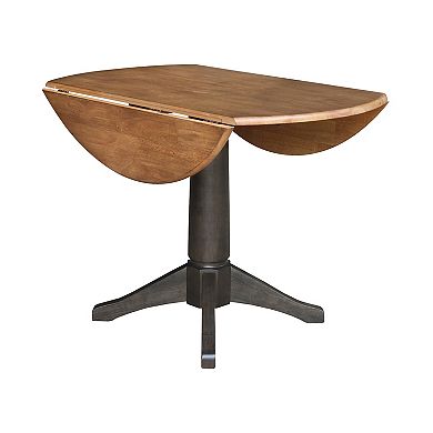 International Concepts Round Dual Drop Leaf Pedestal Table