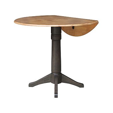 International Concepts Round Dual Drop Leaf Pedestal Table