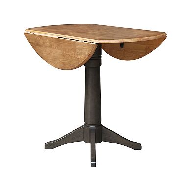 International Concepts Round Dual Drop Leaf Pedestal Table