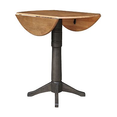 International Concepts Round Dual Drop Leaf Pedestal Table