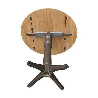 International Concepts Round Dual Drop Leaf Pedestal Table