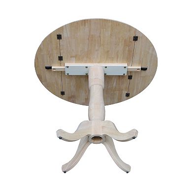International Concepts Round Dual Drop Leaf Pedestal Table