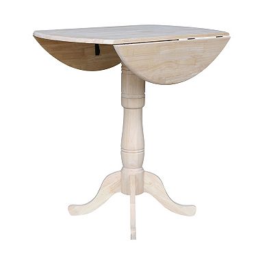 International Concepts Round Dual Drop Leaf Pedestal Table