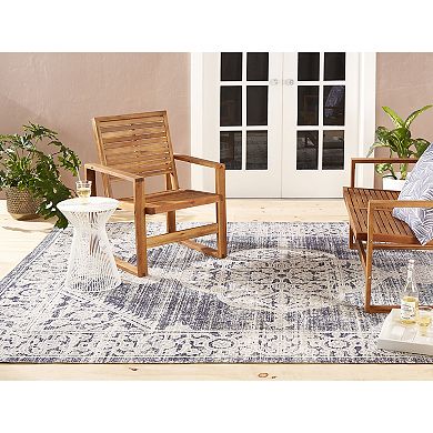 Nicole Miller Kenmare Patio Sofa Magnolia Area Rug