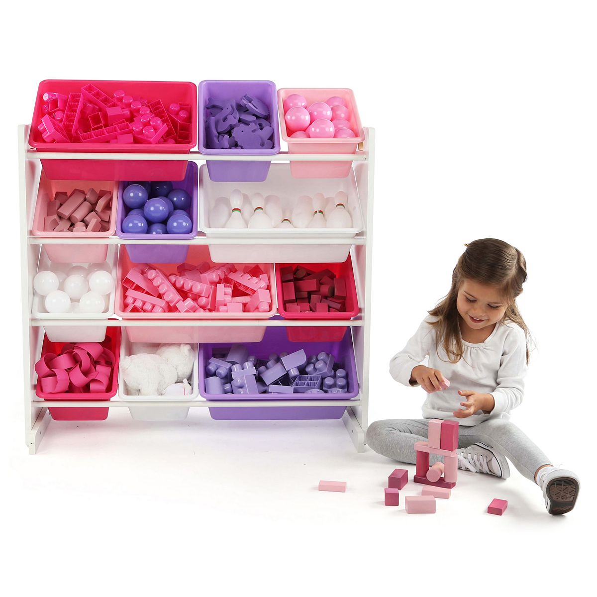 Toy organizer with colorful bins and a child assembling blocks