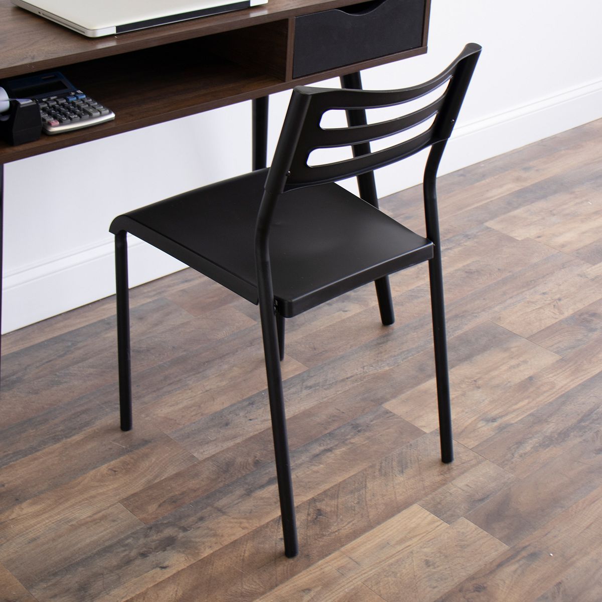 Black upholstered seat desk chair with open back metal frame