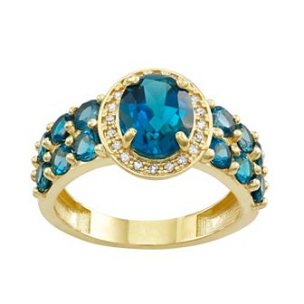 Tiara 10k Gold Gemstone & 1/10 Carat T.W. Diamond Oval Halo Ring