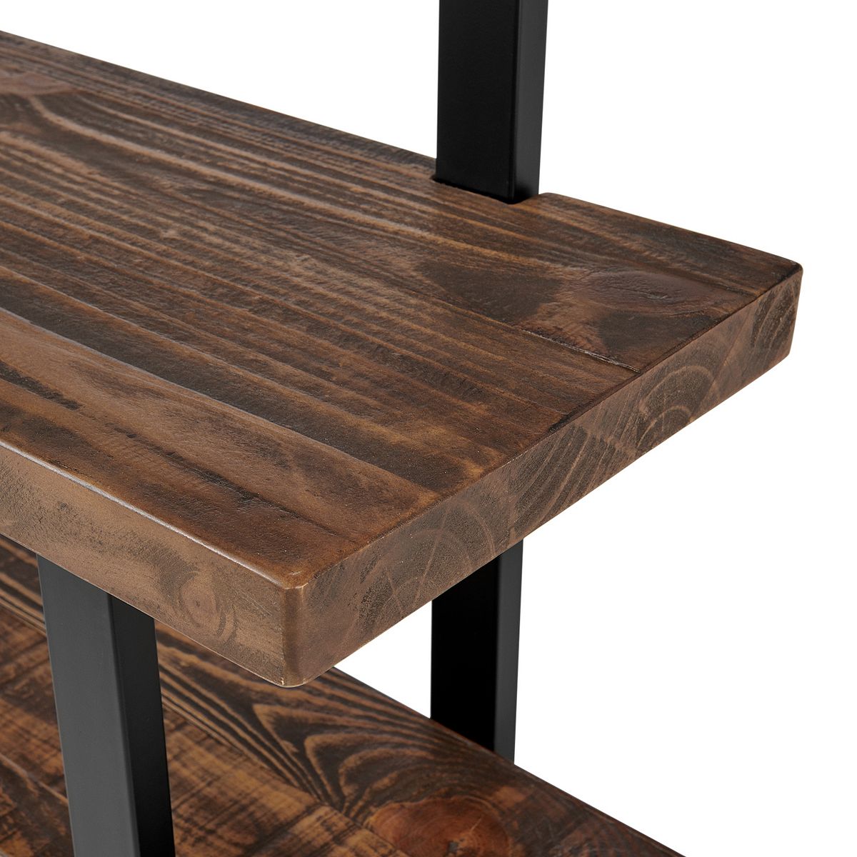 Close-up of distressed wood bench tabletop and metal legs
