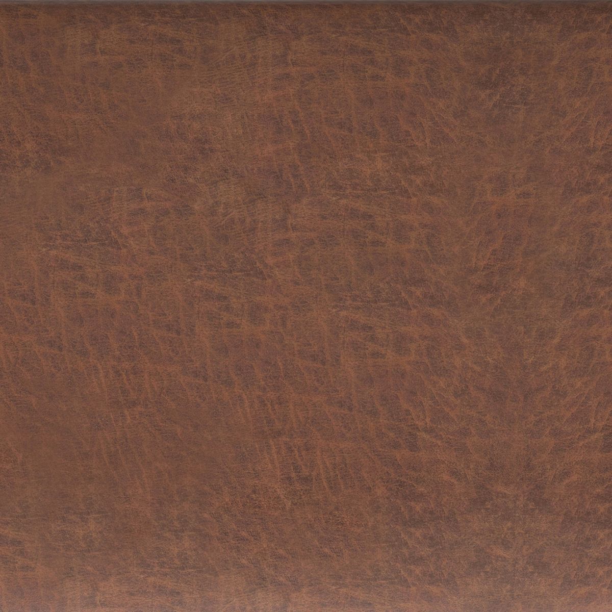 Close-up swatch of brown faux leather upholstery for Avalon ottoman