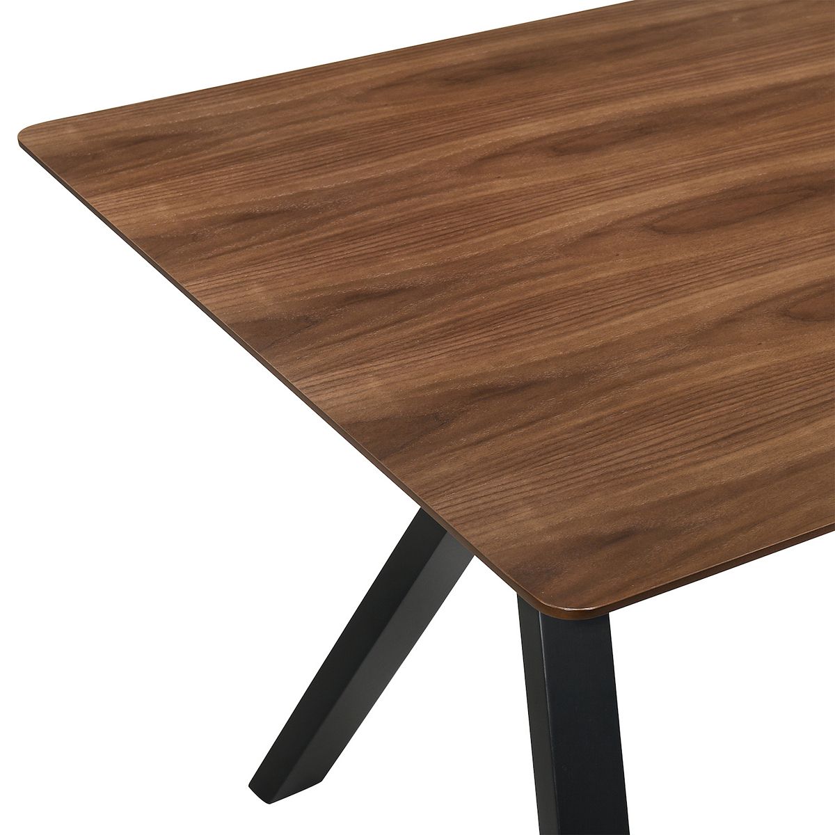 Close-up of walnut wood dining table corner and black leg.