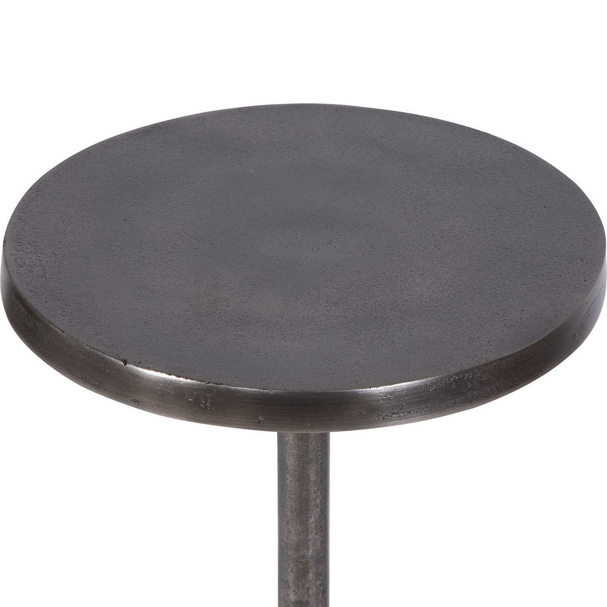Close-up of round dark metal end table top