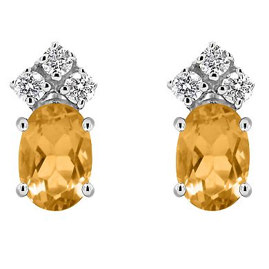 Celebration Gems 14k Gold Oval Citrine & 1/8 Carat T.W. Diamond Stud Earrings