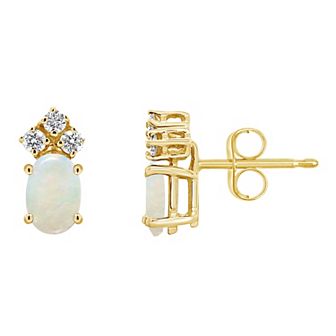 Celebration Gems 14k Gold Oval White Opal & 1/8 Carat T.W. Diamond Stud Earrings