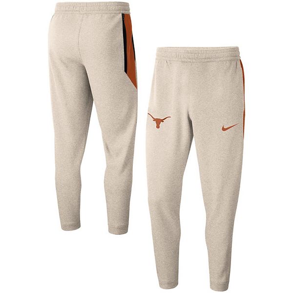 cream nike sweats