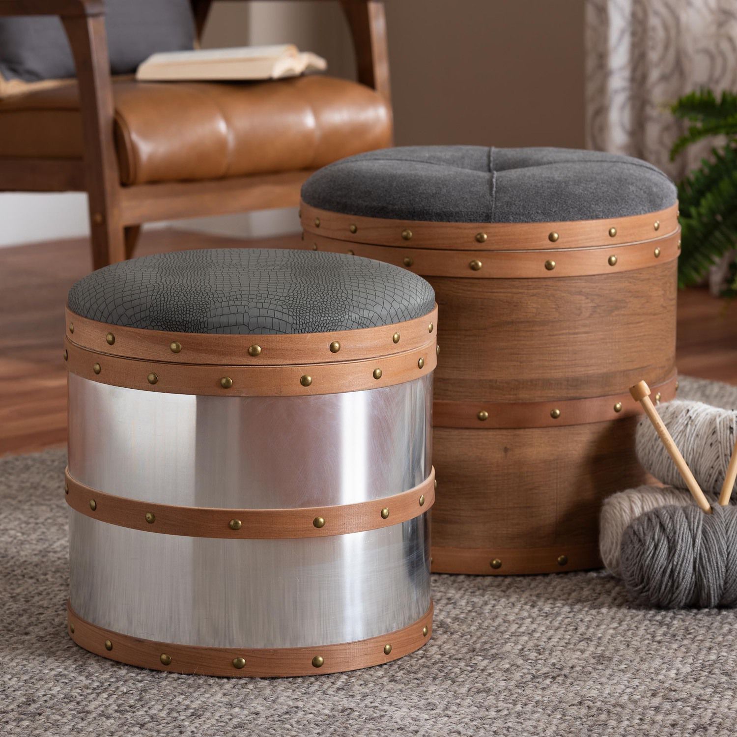 Caleb ottoman pair with gray fabric tops and wood-and-metal studded sides