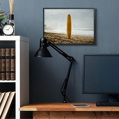 Stupell Home Decor Yellow Surfboard in Sand Near Shore Photograph Wall Art