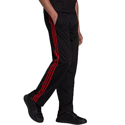 Black adidas pants with red stripes on sale