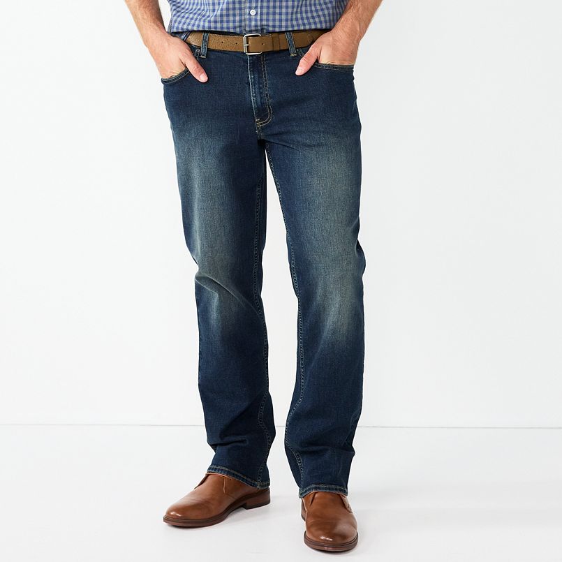 A man wearing blue jeans