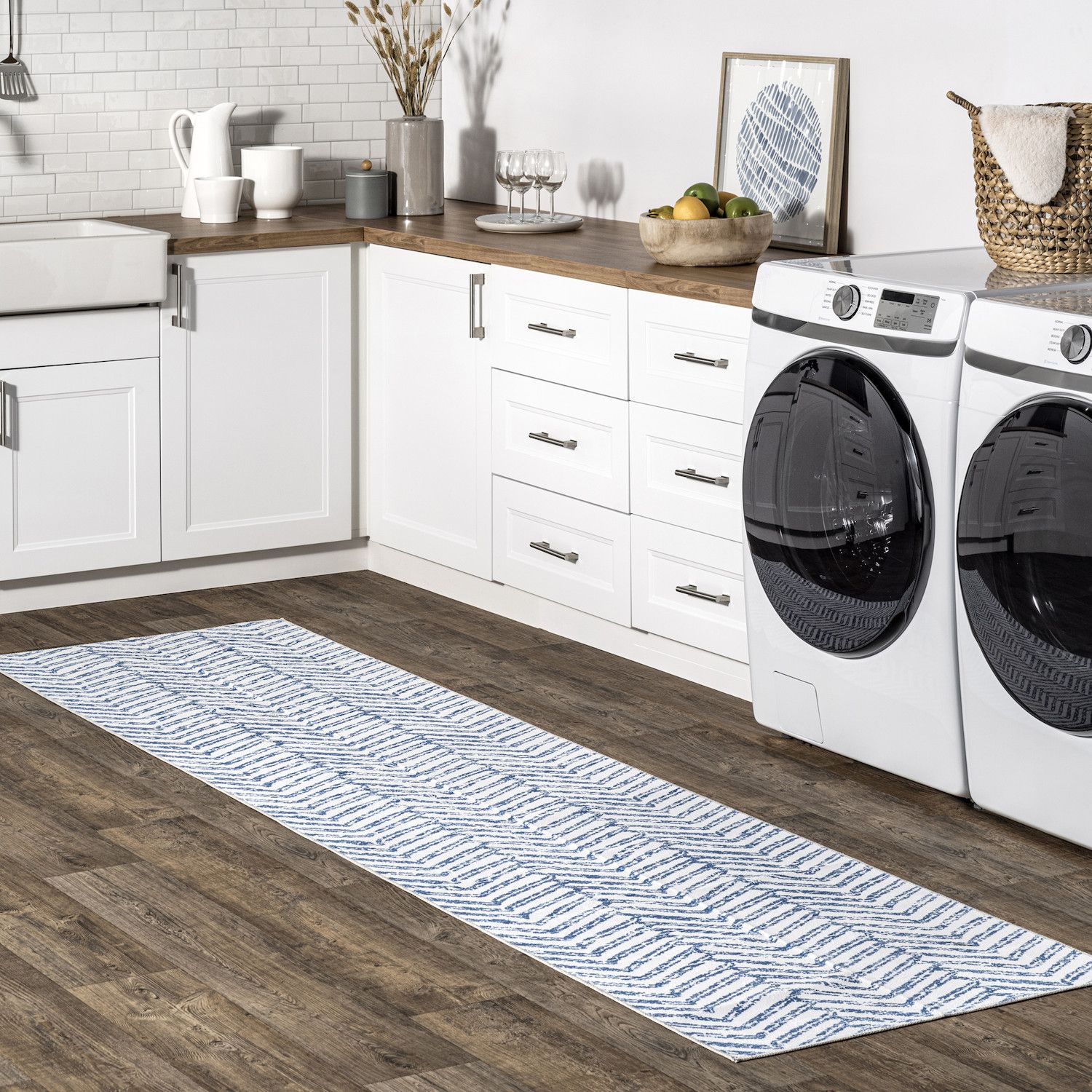 Area rugs offer style and a plush surface that enhances the look of your laundry room.