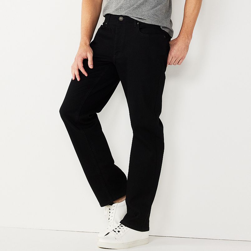 A man wearing black jeans