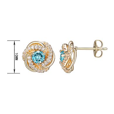 Tokens of Love Sterling Silver Blue Topaz Birthstone Love Knot Stud Earrings