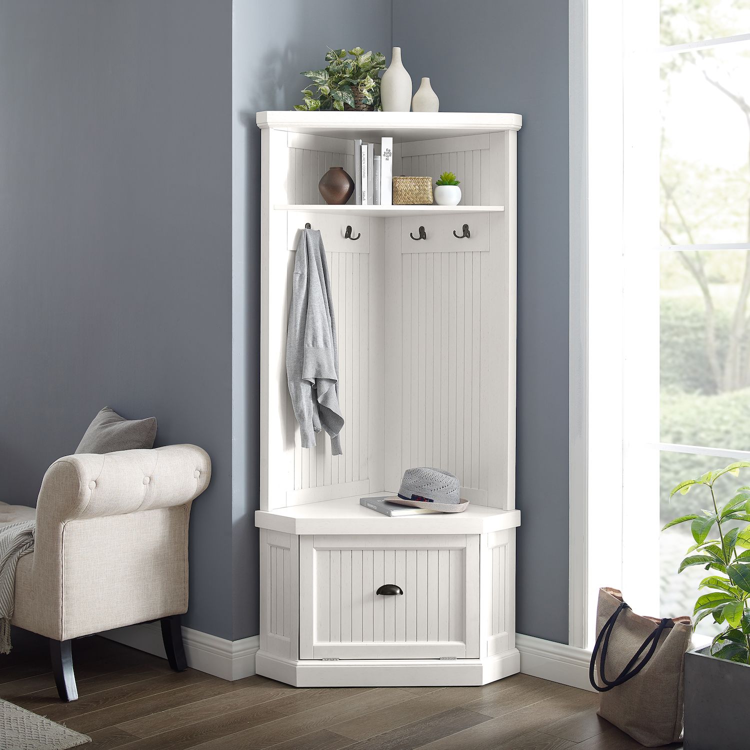 White corner hall tree cabinet with hooks and bench storage