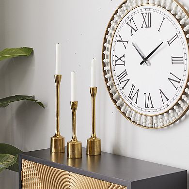 CosmoLiving by Cosmopolitan Gold Finish Taper Candle Holder 3-piece Set