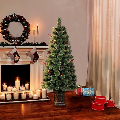 PULEO INTERNATIONAL Pre-Lit 4.5' Potted Natural Pine Artificial Christmas Tree with 70 Lights