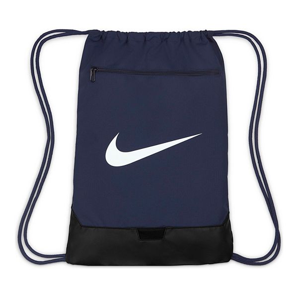 Nike Brasilia 9.5 Training Duffel Bag Geode Green The Nike Brasilia Duffel  Bag keeps all your training gear at hand. A side compartment stores shoes  separately, while inside and outside pockets help