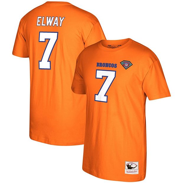 A man wears a souvenir John Elway football jersey. Elway was a